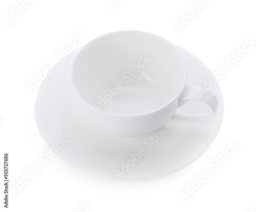 white ceramic cup on white background