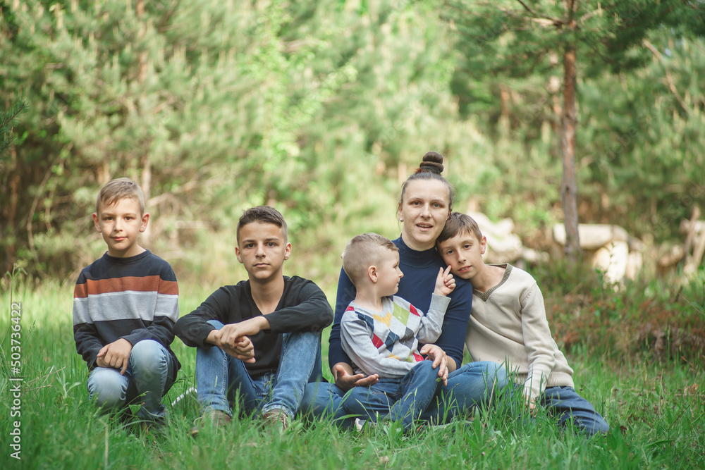 mother with children in a nature park mother with children in a nature park