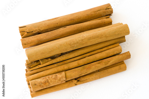 Rolled dry cinnamon isolated on a white background