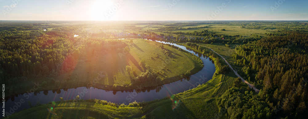 Summer sunset above the river