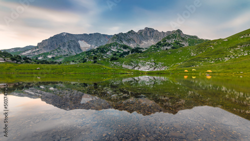 Obraz na płótnie Mountain landscape with a lake w salonie