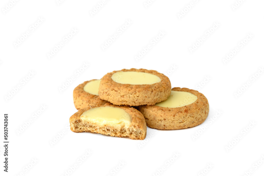 Round shortbread cookies with lemon filling isolated on white background. Round shortbread cookies with lemon filling isolated on white background.