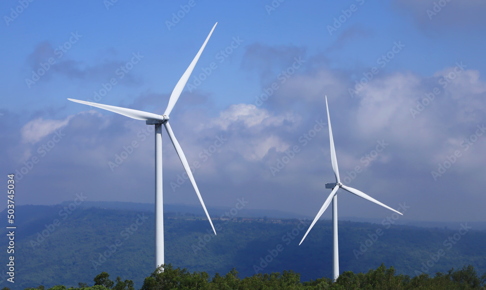 Wind turbine generators are located in the windy mountains, suitable for receiving wind to generate electricity. Clean energy, green energy, renewable. Wind turbine generators are located in the windy mountains, suitable for receiving wind to generate electricity. Clean energy, green energy, renewable.