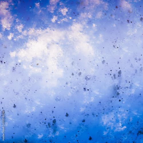  Texture from chaotic drops. Blue shades on a light background.