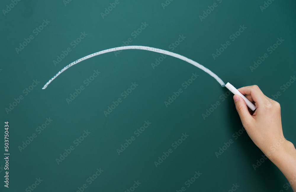 Hand drawing arc on blackboard Hand drawing arc on blackboard