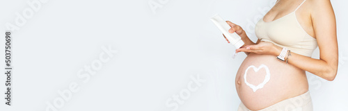 Wallpaper Mural Closeup photography of young Woman touching hands her naked big belly Isolated on white background with copy space. Skin care with moisturising cream against stretch marks. Emotional loving pregnancy Torontodigital.ca