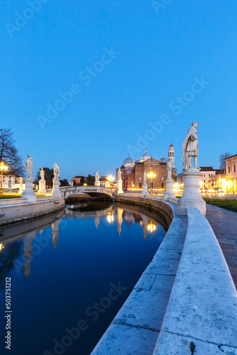 Padua Prato Della Valle square with statues travel traveling holidays vacation town portrait format at night in Padova, Italy