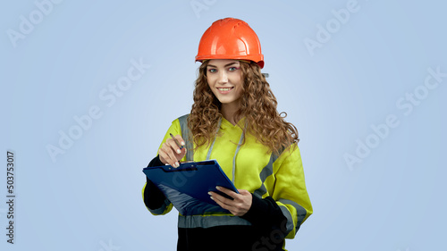 young female foreman smiling posing on camera