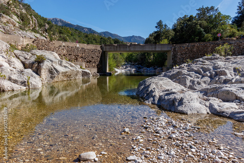 Flumineddu river on the hiking trail to Gola di Gorropu in Italy photo