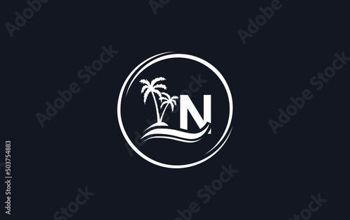 Nature water wave and beach tree vector art logo design with the letter and alphabet N