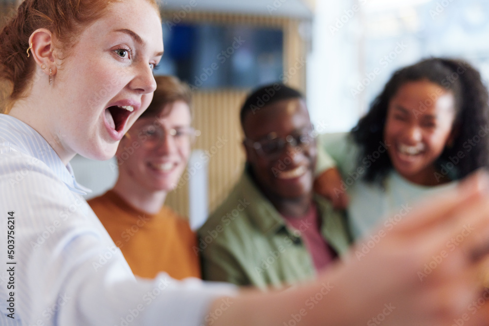 Diverse teenagers taking selfies together Diverse teenagers taking selfies together