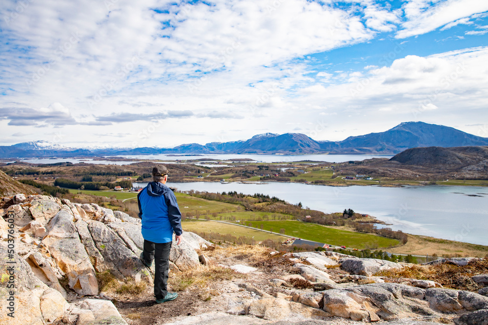 Obraz premium Hiker on Vikerheia mountain,Northern Norway,scandinavia,Europe