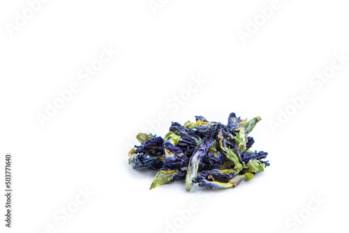 Handful of dried butterfly pea flowers on white. Blue flower for tea.
