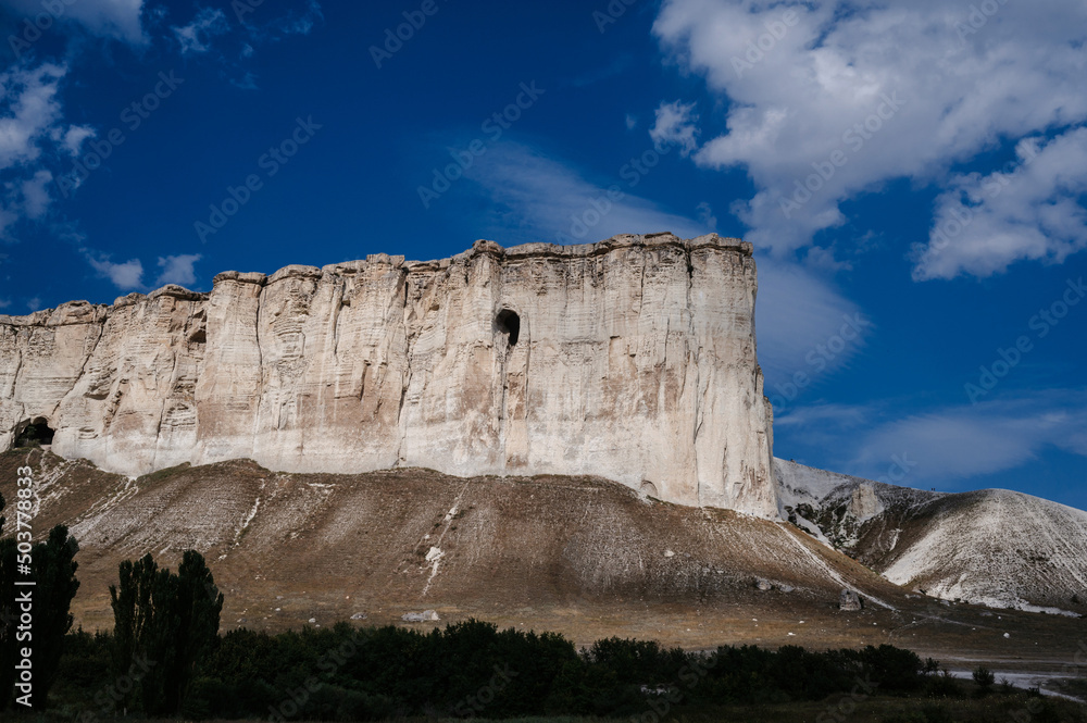 Ak-Kaya or White rock in Crimea rocky limestone plateau in summer under a blue sky