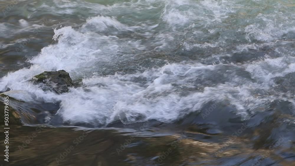 A bubbling mountain river A bubbling mountain river