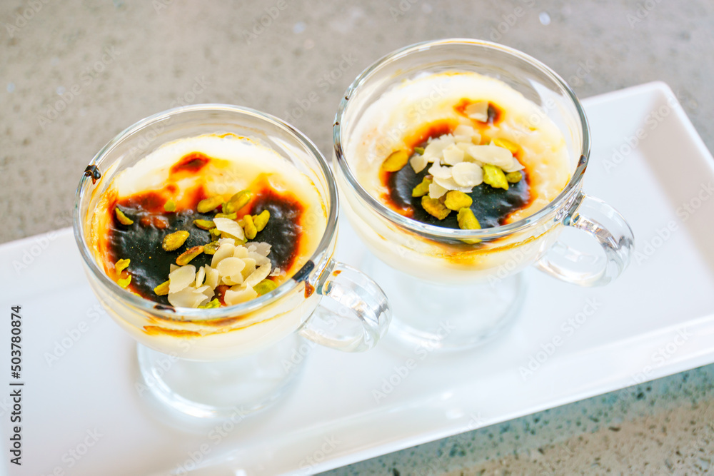 Sweetness for breakfast. Traditional Turkish pudding. Delicious treat from Turkey Sweetness for breakfast. Traditional Turkish pudding. Delicious treat from Turkey