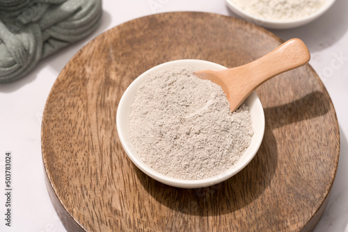 Εκτύπωση καμβά White bowl with gray cosmetic clay on wooden tray - mineral powder, bentonite facial mask with volcanic soil