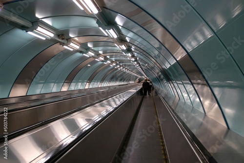 Travolator tunnel with metal and plastic finish