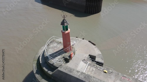 Aerial view of the Watchet Harbor Lighthouse in Somerset, England photo