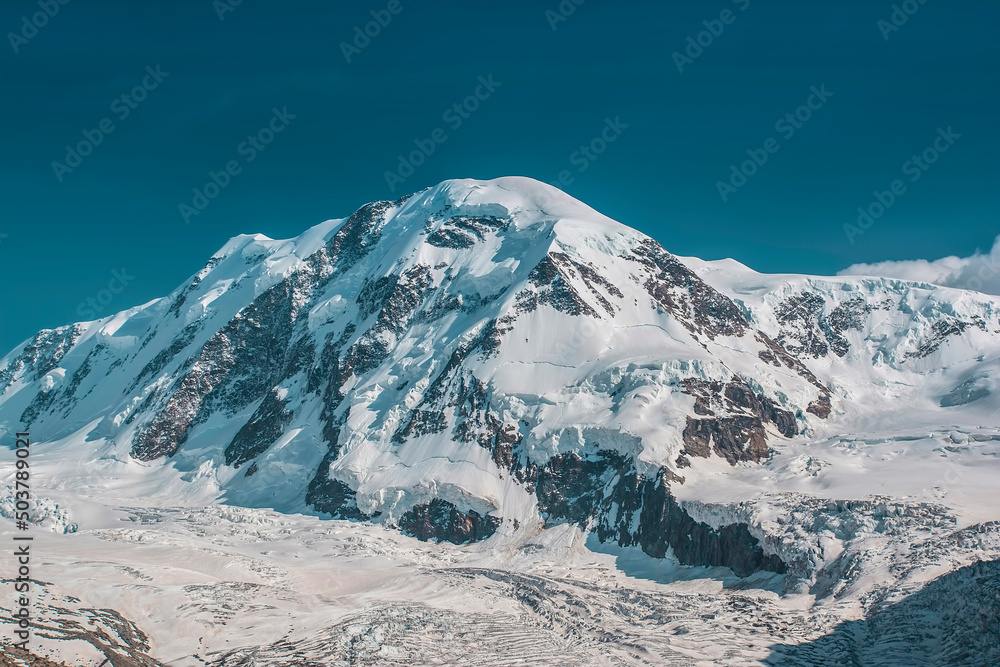 The Liskamm/Lyskamm (4.533m) rising above Gorner glacier on the Swiss/Italian border near Zermatt, Switzerland 
