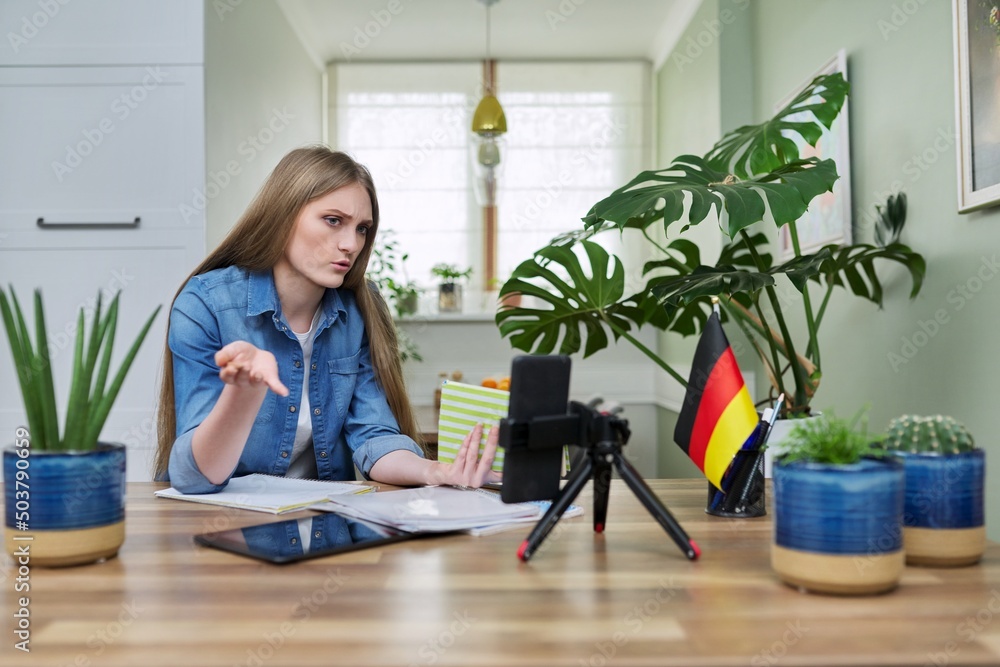 Remote distance learning, online lesson of female student using smartphone Remote distance learning, online lesson of female student using smartphone