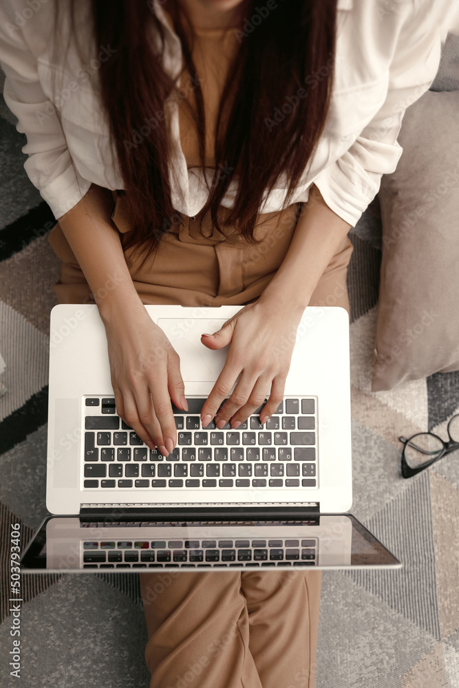 Working at home with laptop woman writing a blog. Female hands on the  keyboard. Stock-Foto | Adobe Stock