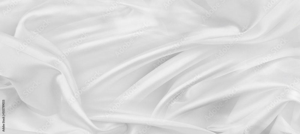 Close-up of rippled white silk fabric texture