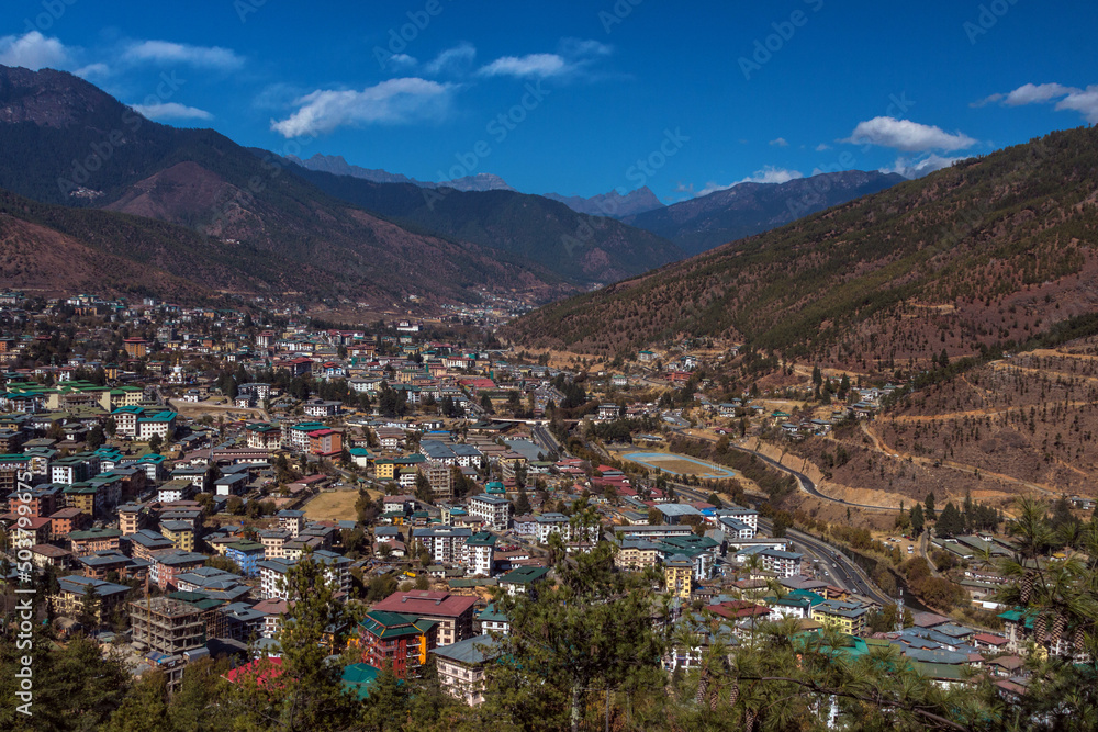 Paro, Bhutan. Its airport is described as one of the most difficult in the world but still serves as the only entry point for international visitors.