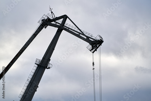 Industrial sea port with many cranes view photo