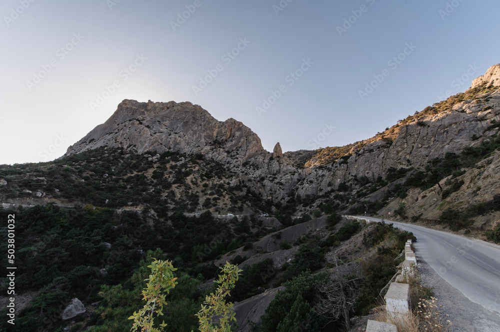 Fototapeta premium View of Sokol Mountain near town of Sudak in Crimea on Black Sea coast in summer