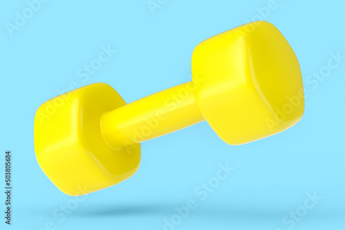 Rubber yellow dumbbell isolated on blue background