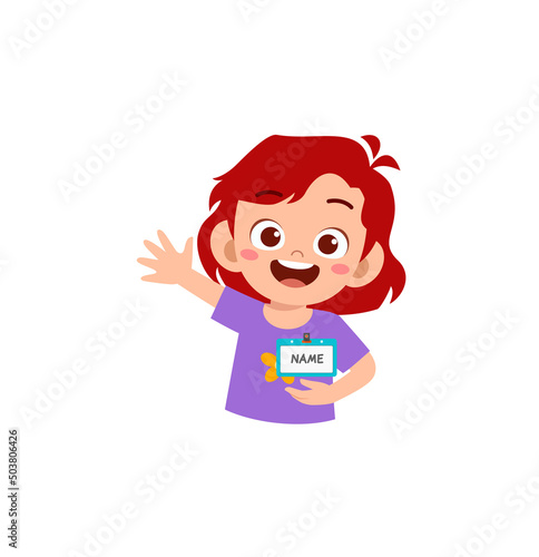 little kid holding name tag and feel happy