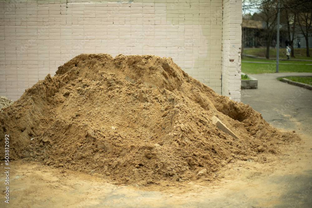 Construction sand. Pile of sand at construction site. Stock Photo Adobe Stock