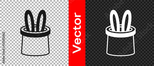 Black Magician hat and rabbit ears icon isolated on transparent background. Magic trick. Mystery entertainment concept. Vector