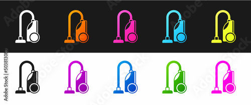 Set Vacuum cleaner icon isolated on black and white background. Vector