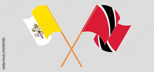 Crossed and waving flags of Vatican and Trinidad and Tobago