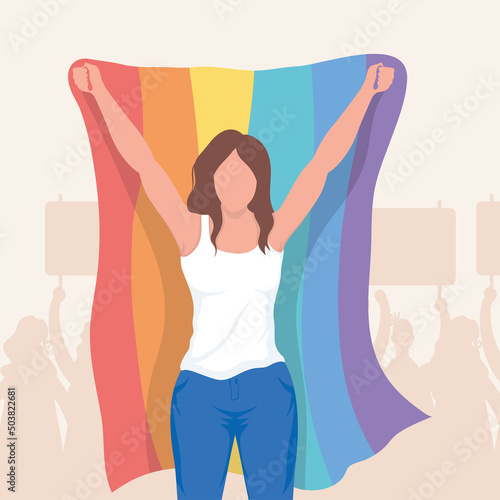 woman lifting lgbtq flag scene