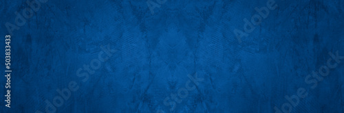 Old wall pattern texture cement blue dark abstract  blue color design are light with black gradient background. © Kamjana