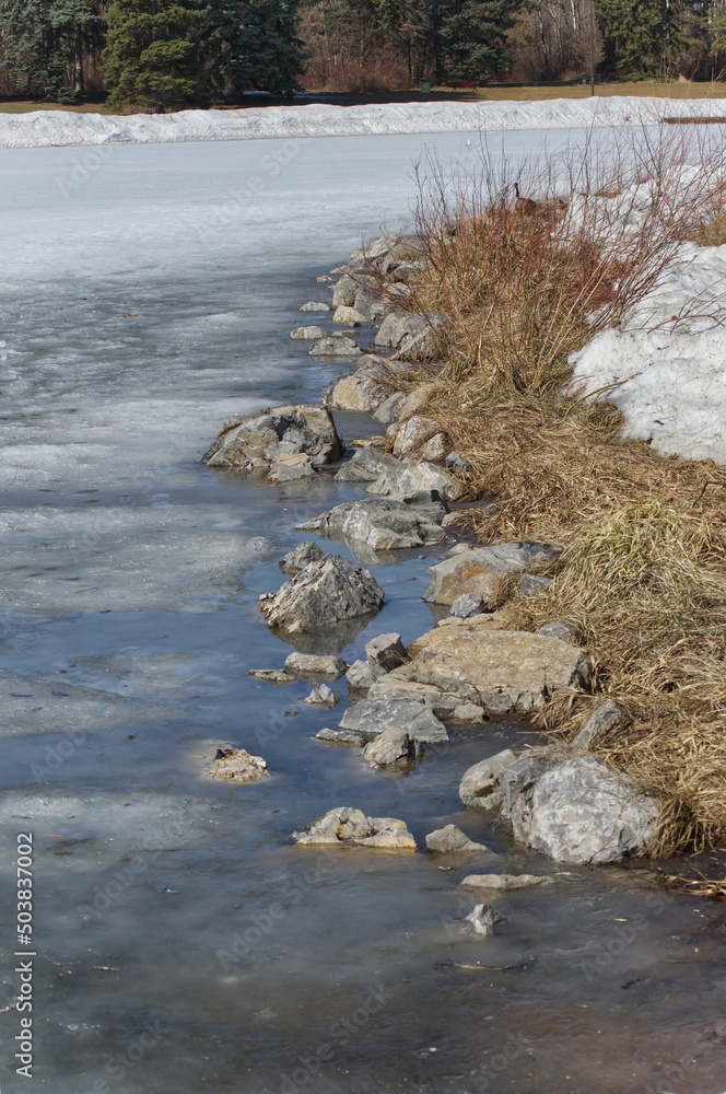 Rocks at a Frozen Pond Rocks at a Frozen Pond