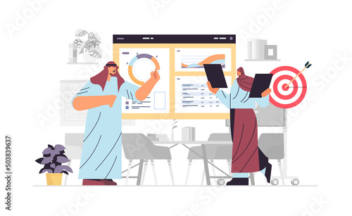 arab businesspeople analyzing statistics data on diagram business report presentation concept