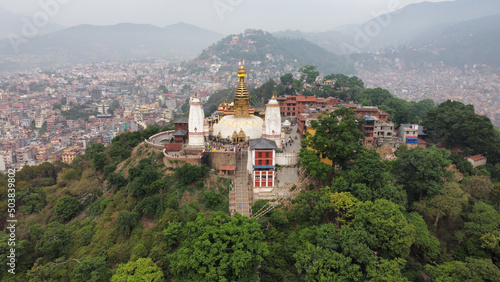 Bird's eye view of the Swayambhu religious complex in bright sunlight in Kathmandu, Nepal
