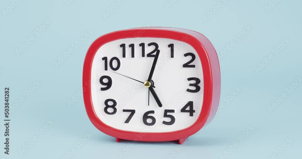Blue background and Desk clock showtimes about 12.25 am or pm. Blue background and Desk clock showtimes about 12.25 am or pm.