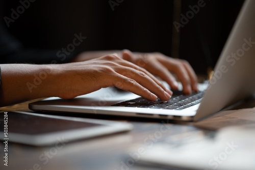 professional business person typing on computer laptop desk at office, using keyboard technology for working on online workplace communication job
