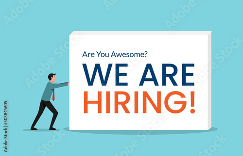 Businessman Pushing the box with the text we are hiring. Business recruiting design concept.