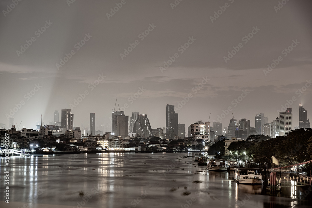 Fototapeta premium city at night , Chao Phraya river , Bangkok ,Thailand. 