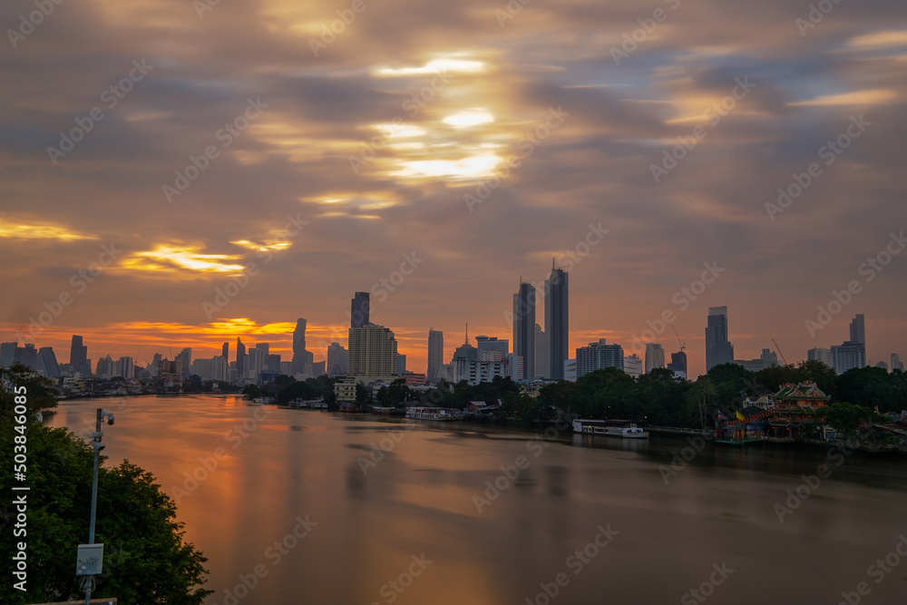 city skyline at sunrise  ( long exposure )  good moring Bangkok 