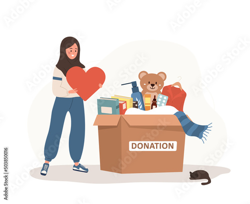 Donation box with clothes, toys, books and medicines. Arabic volunteer woman holding in hands heart. Share your love. Support for poor people and children. Vector illustration in flat cartoon style.