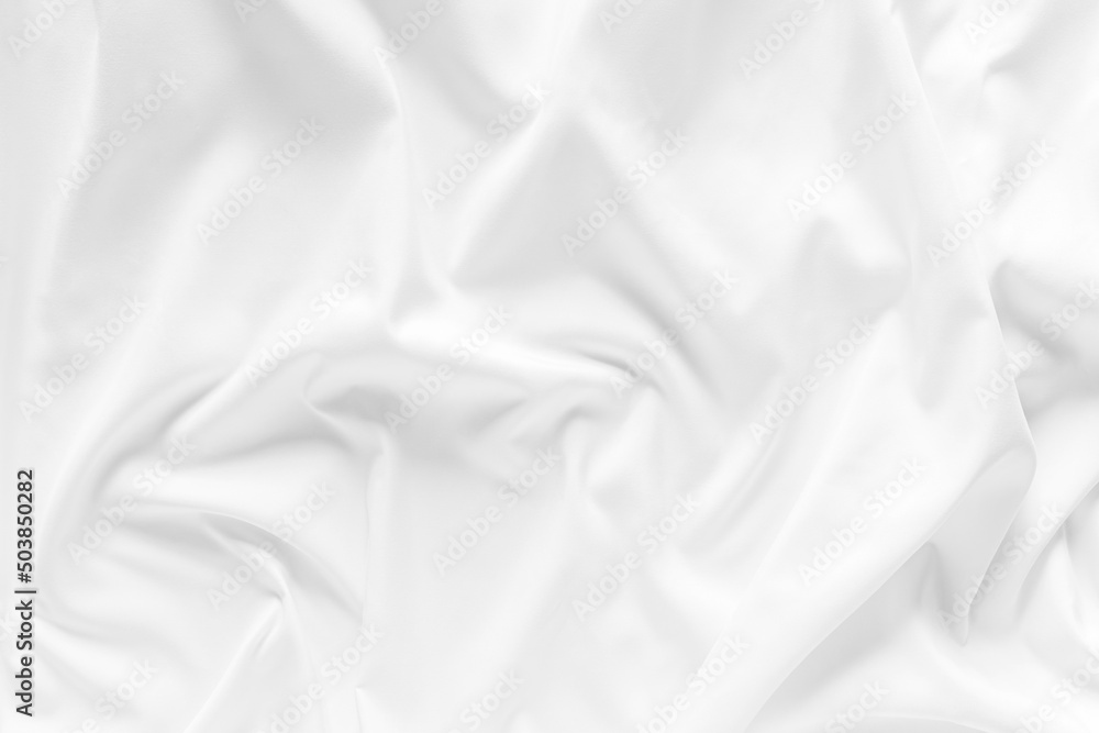 white fabric. luxurious white fabric texture background. Creases of satin, silk, and cotton.