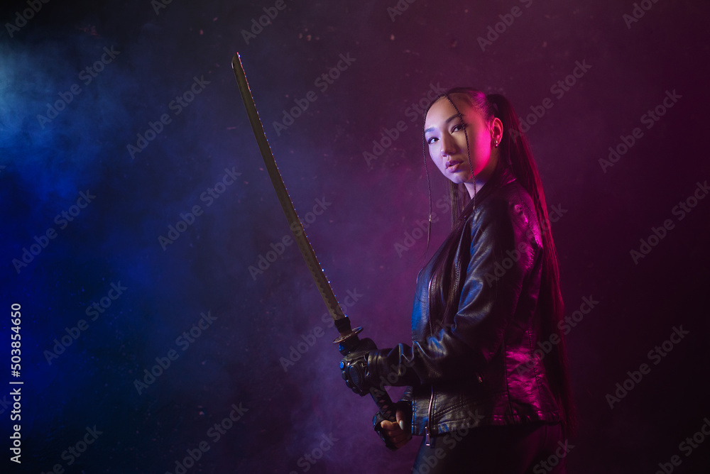 Concept of futuristic woman soldier with the katana sword in the neon lights.