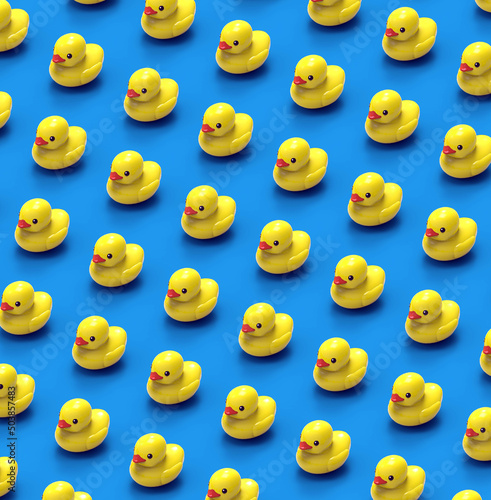 Yellow duck pattern on pastel blue background. Summer minimalism. Isometric flat lay. rubber duck